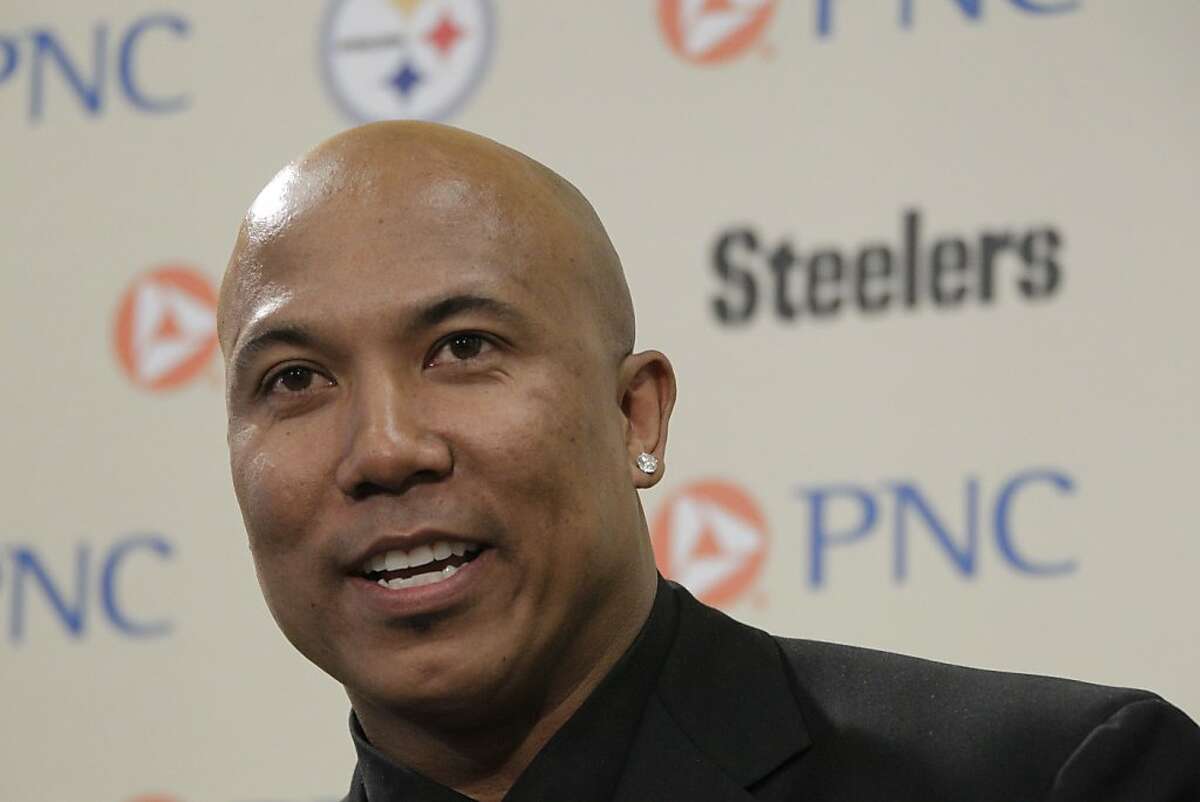 Former Pittsburgh Steelers receiver Hines Ward answers a question after announcing his retirement from the NFL at the Steeler's offices in Pittsburgh Tuesday, March 20, 2012. (AP Photo/Gene J. Puskar)