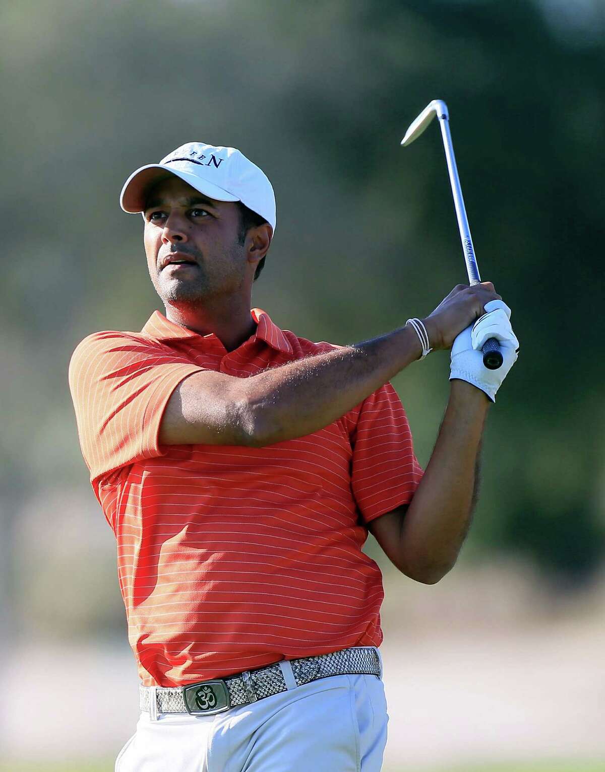 Arjun Atwal, who is in danger of losing his card, held on to a one-stroke lead in the McGladrey Classic.