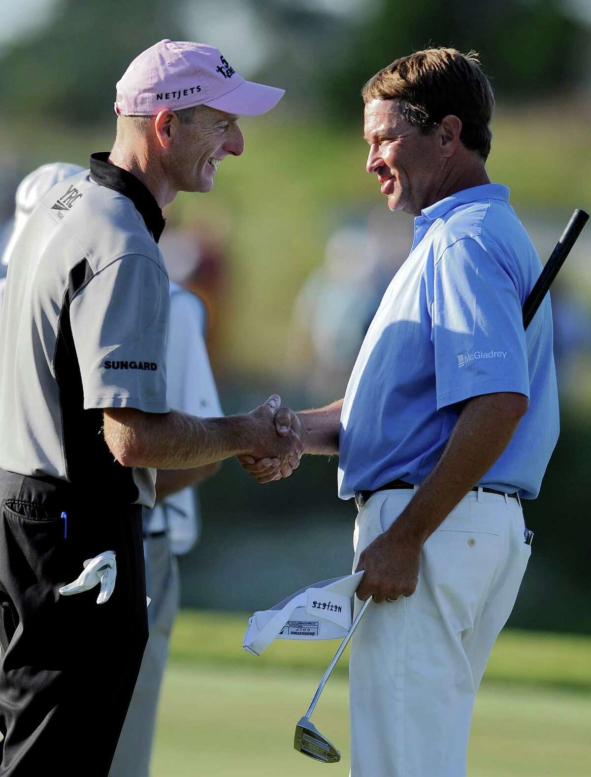 McGladrey co-leaders Davis Love III, left, and Jim Furyk will see who shakes out ahead today.