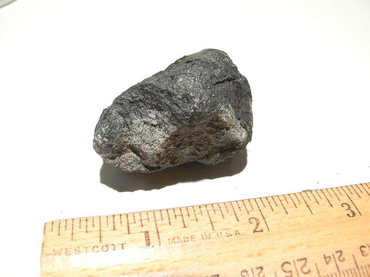 A gray, 2-inch rock that hit a Novato home is the first confirmed chunk of the meteor that dramatically exploded over the Bay Area last week. Lisa Webber found the meteorite in her yard on Saturday, three days after the object fell onto the roof of her home on Saint Francis Avenue.
