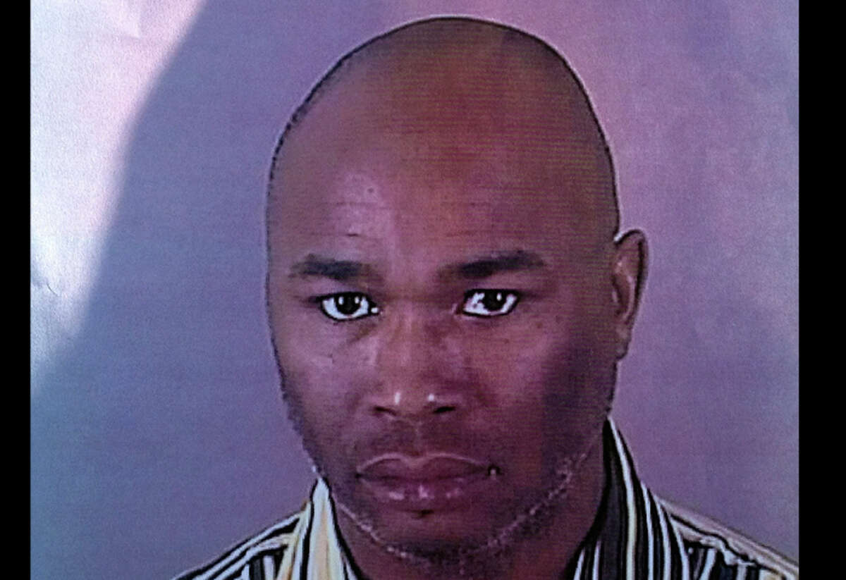 This photo provided by the Brookfield Police Dept. shows Radcliffe Franklin Haughton, 45, of Brown Deer, Wis. Deputies are searching for Haughton on Sunday, Oct. 21, 2012, who's suspected of wounding multiple people in a shooting at a spa near a suburban Milwaukee shopping mall. (AP Photo/Brookfield Police Dept)