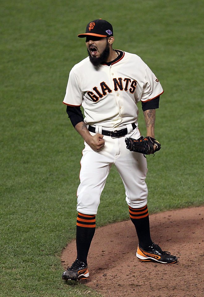 San Francisco Giants closer Sergio Romo celebrates a 2-0 win against the  Detroit Tigers in Game 2 of the 2012 World Series at AT&T Park on Thursday,  October 25, 2012, in San