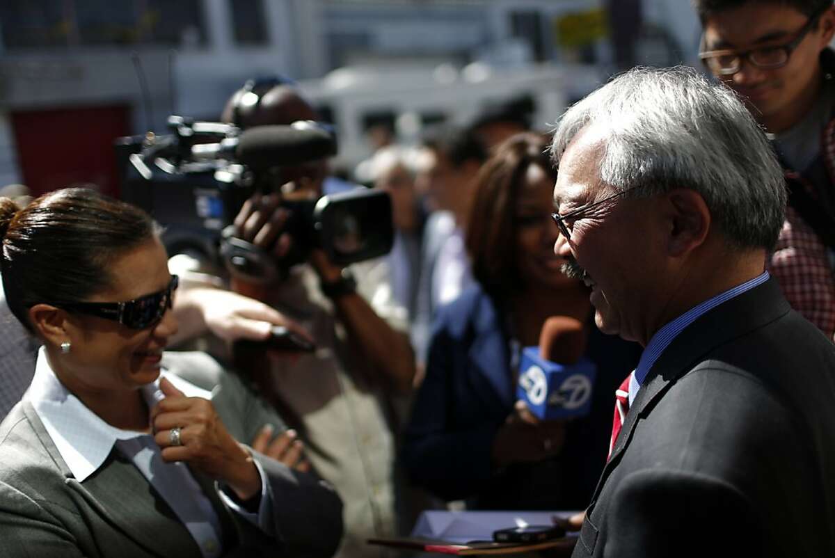 Mayor Ed Lee (right) is interviewed after speaking in support of Proposition E during a rally on Thursday, September 20, 2012 in San Francisco, Calif.