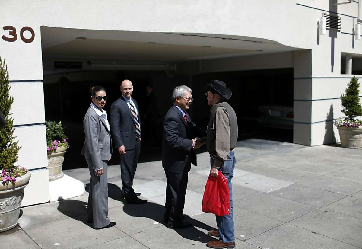 Mayor Ed Lee shakes hands after speaking in support of Proposition E during a rally on Thursday, September 20, 2012 in San Francisco, Calif.