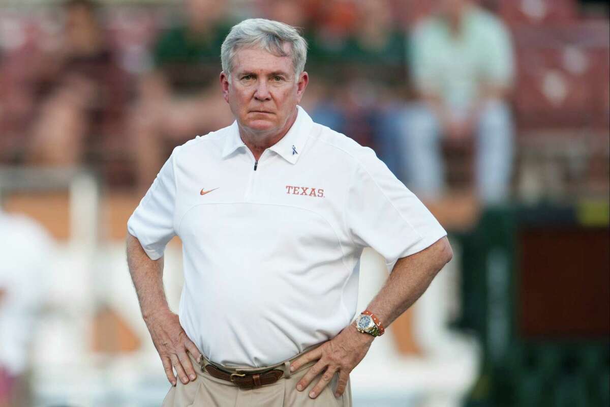 AUSTIN, TX - OCTOBER 20: University of Texas head coach Mack Brown looks on as his team warms up before the Big 12 Conference game against the Baylor University Bears on October 20, 2012 at Darrell K Royal-Texas Memorial Stadium in Austin, Texas. (Photo by Cooper Neill/Getty Images)