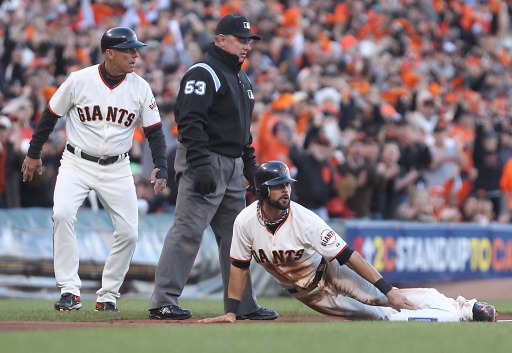 Giants' Game 7 romp led by Cain, Scutaro