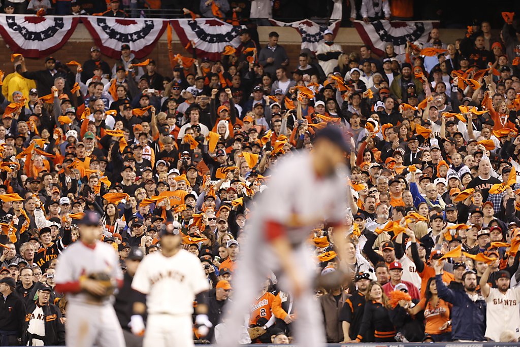 Giants closer Sergio Romo celebrates in the rain after Game 7 of the 2012  NLCS in which the San Francisco Giants d…