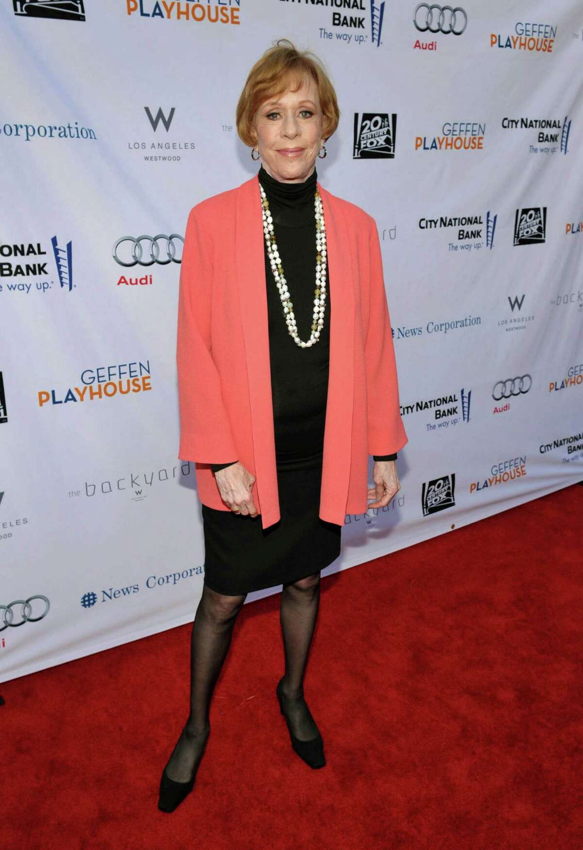 FILE - In this June 4, 2012 publicity image provided by Geffen Playhouse, Carol Burnett arrives at the "Backstage At The Geffen" Fundraiser at the Geffen Playhouse, in Los Angeles. On Jan. 10, 2013, Burnett will be honored with the "Carol Burnett Honor of Distinction Award," presented by The Hollywood High School Performing Arts Center at the El Capitan Theatre in Hollywood, Calif. (AP Photo/Geffen Playhouse, John Shearer, File)