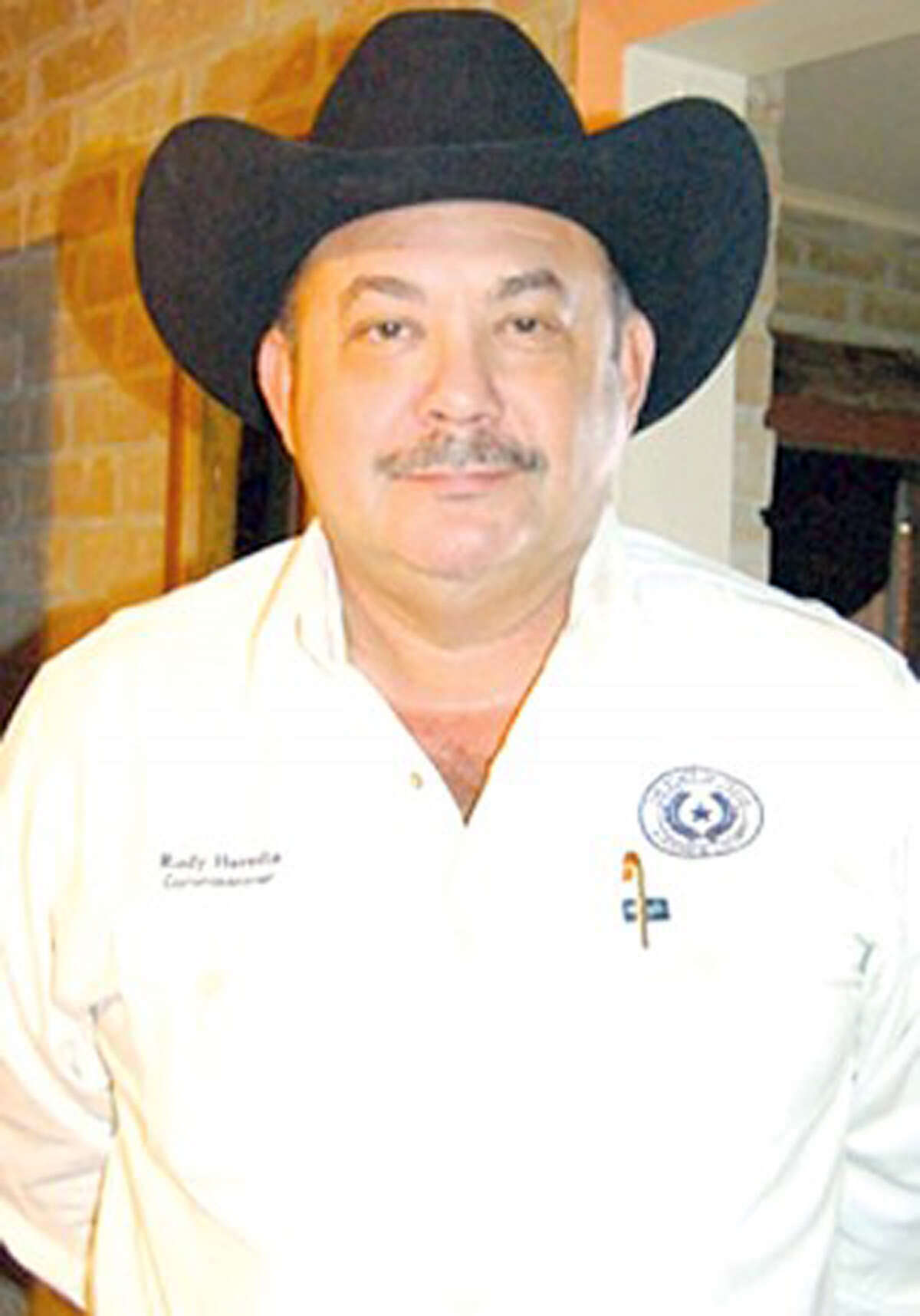 Maverick County Commissioner Rodolfo Heredia is accussed of smuggling money into the United States from Mexico after selling his truck to a Zetas associate.