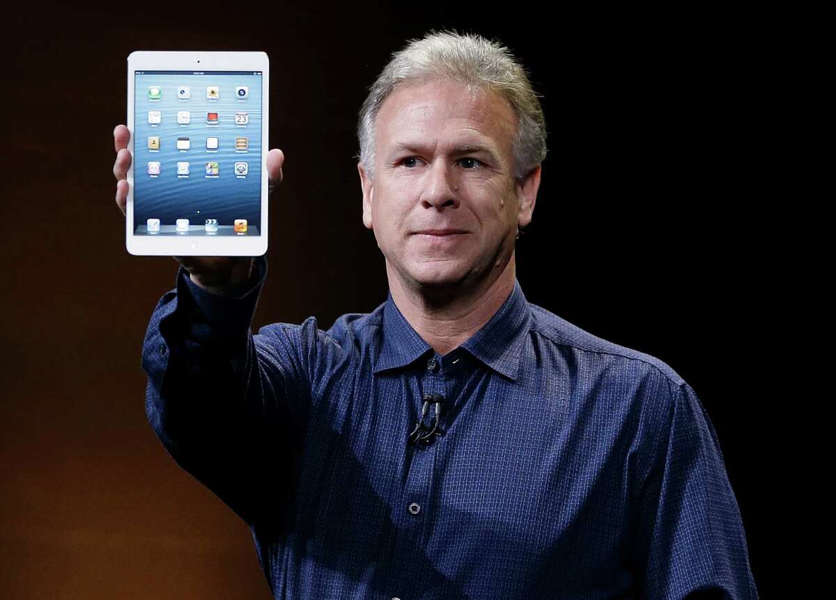 Phil Schiller, Apple's senior vice president of worldwide product marketing, introduces the iPad Mini in San Jose, Calif., Tuesday, Oct. 23, 2012. (AP Photo/Marcio Jose Sanchez)
