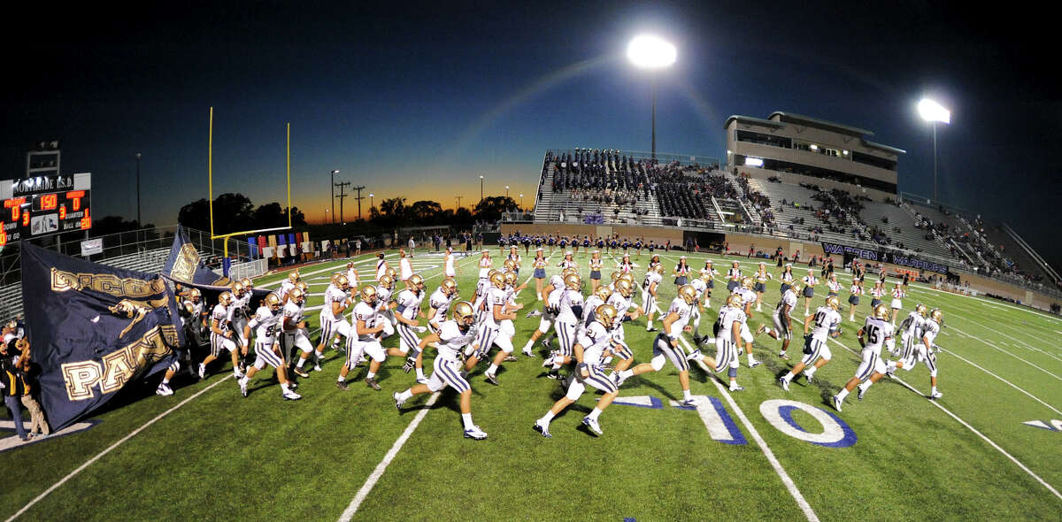 The O'Connor Panthers take the field before a district football game between the Warren Warriors at Farris Stadium Saturday, Oct. 19, 2012.