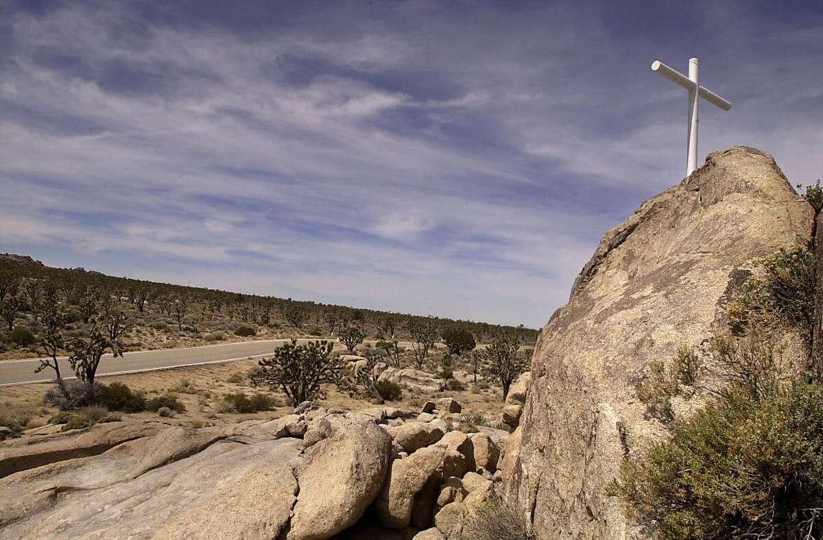 FILE - This 2002 photo shows the Mojave Cross in the Mojave National Preserve. Authorities say the 7-foot-tall cross that sparked a U.S. Supreme Court dispute was stolen around May 9, 2010.