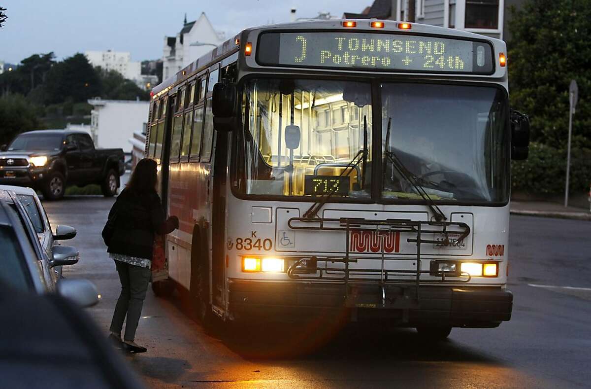 A passengers boards an inbound 10-Townsend Muni bus at Laguna and Washington streets in San Francisco, Calif. on Wednesday, Oct. 24, 2012.