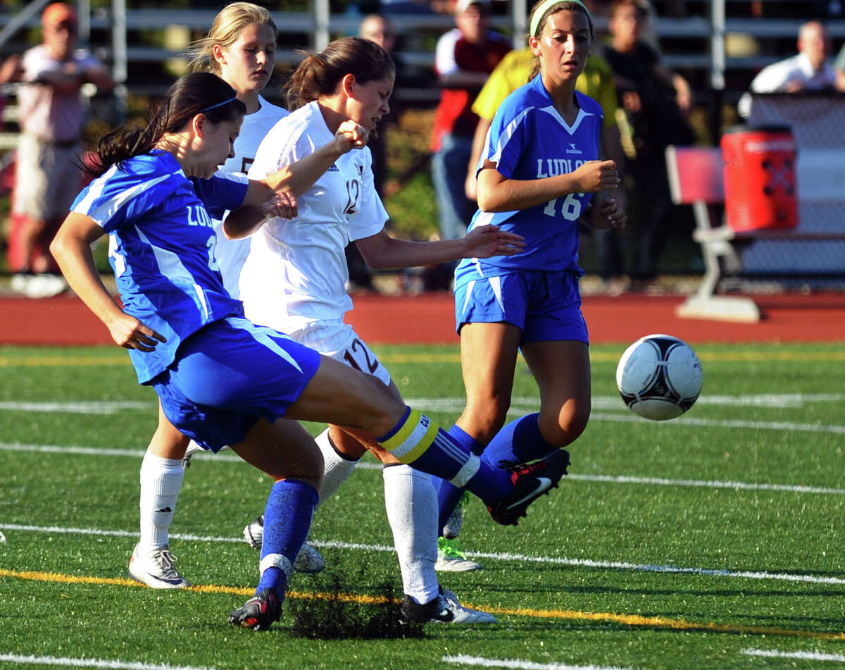 Fairfield Ludlowe's Allyson Doyle kicks the ball away as St. Joseph's Sylvia Yanaz during the Falcons' game with the Cadets on Sept. 12.