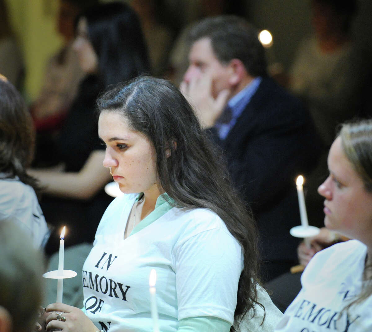 Jody Greene, 17, a Greenwich High School senior, during the candlelight vigil ceremony to observe Domestic Violence Awareness Month at the Greenwich YWCA, Thursday night, Oct. 25, 2012.