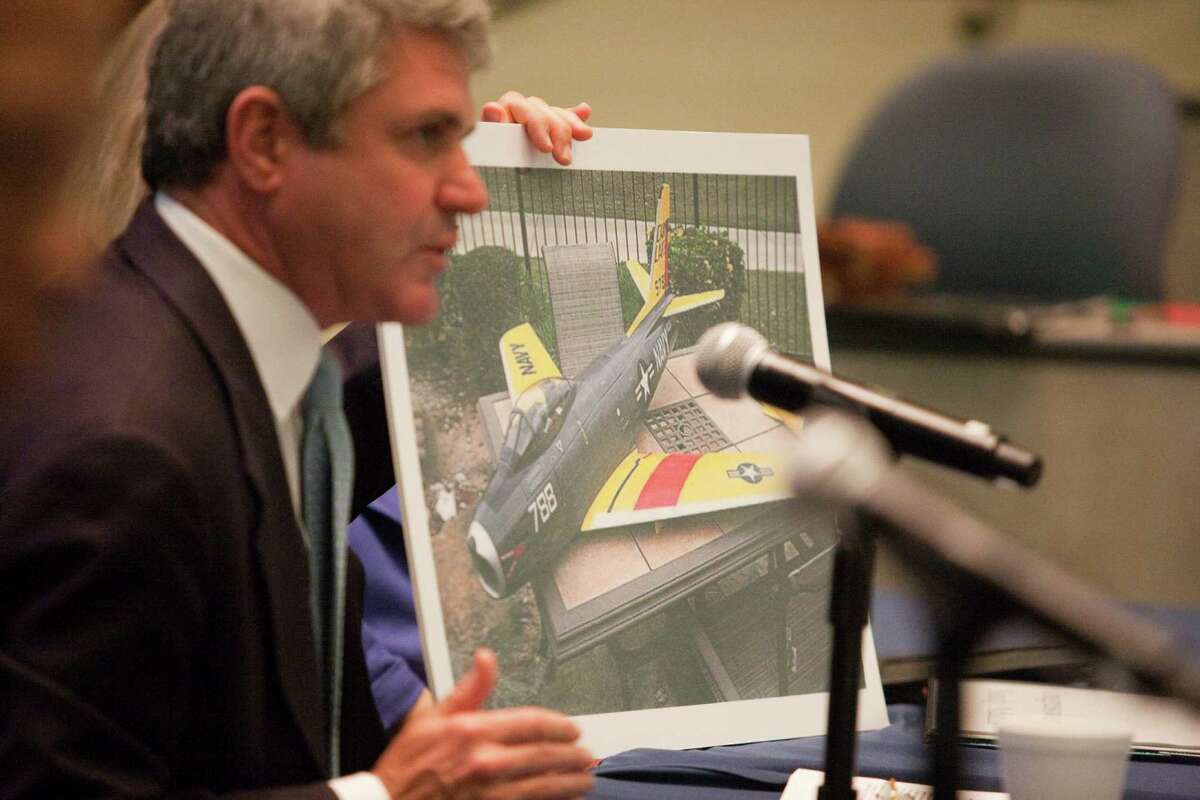 U.S. Rep. Michael McCaul, R-Austin, displays an example of the kind of remote-controlled aircraft used as drones for surveillance during Thursday's forum.