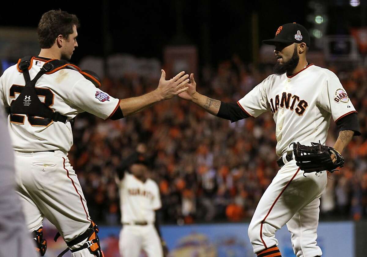 San Francisco Giants closer Sergio Romo celebrates a 2-0 win