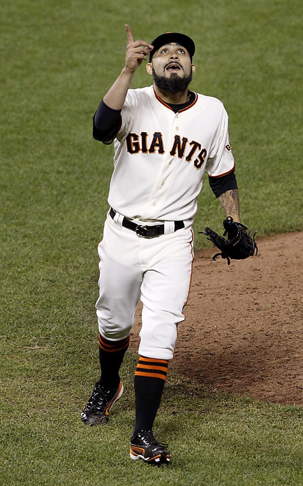 San Francisco Giants closer Sergio Romo celebrates a 2-0 win against the  Detroit Tigers in Game 2 of the 2012 World Series at AT&T Park on Thursday,  October 25, 2012, in San