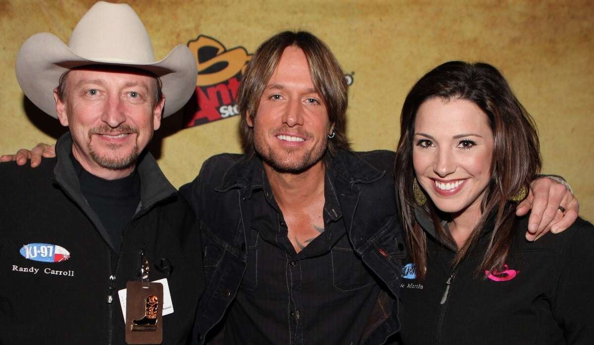 Randy Carroll and Jamie Martin (pictured with country star Keith Urban) have been named the CMA's Broadcast Personality of the Year -- Large Market.
