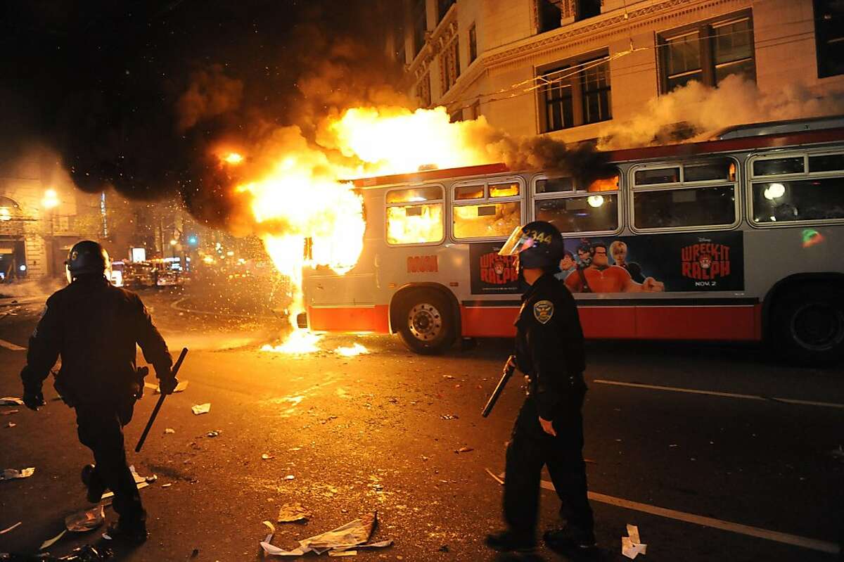 A bus is set on fire in San Francisco after the Giants won the World Series on October 28, 2012.