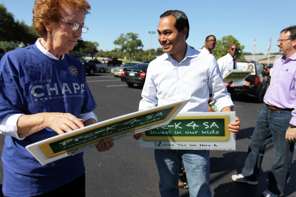 Mayor Julián Castro talks with supporter Sister Miriam Mitchell of the Convent of the Holy Spirit and Mary Immaculate as he campaigns outside the Claude W. Black Center last week.