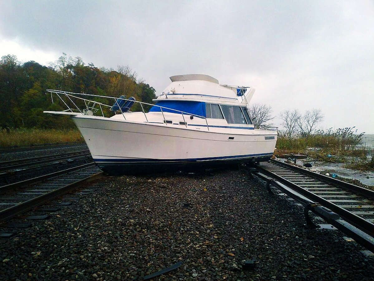 Boat on Metro-North railroad tracks on Hudson line after Hurricane Sandy