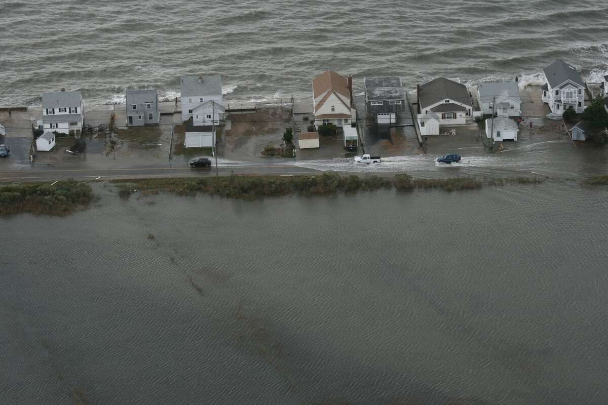 A Connecticut National Guard photographer took this photo during an aerial assessment of damage caused along the shoreline by Hurricane Sandy in 2012. Click through to see photos of some of the worst hurricanes to have landed in the state.