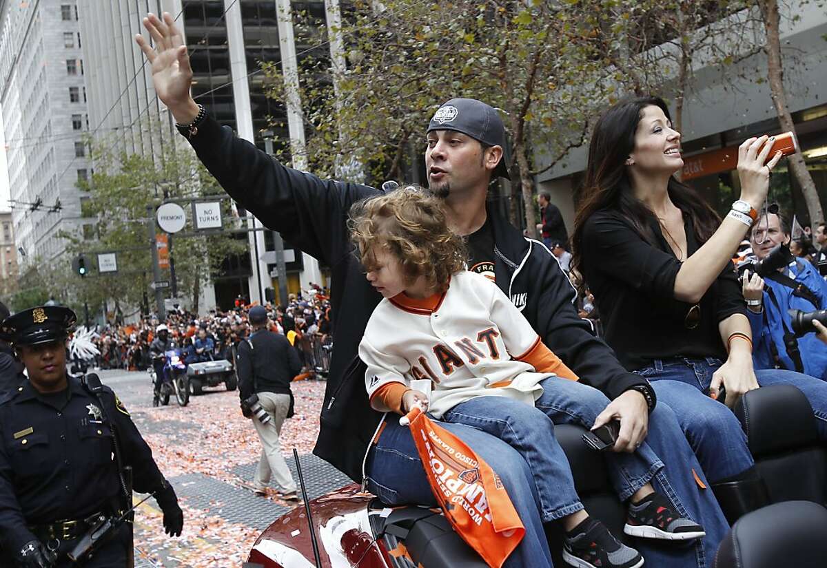 Ryan Vogelsong and his family waved to the appreciative crowd. The San Francisco Giants celebrated their second World Series title in three years with a parade down Market Street Wednesday October 31, 2012.