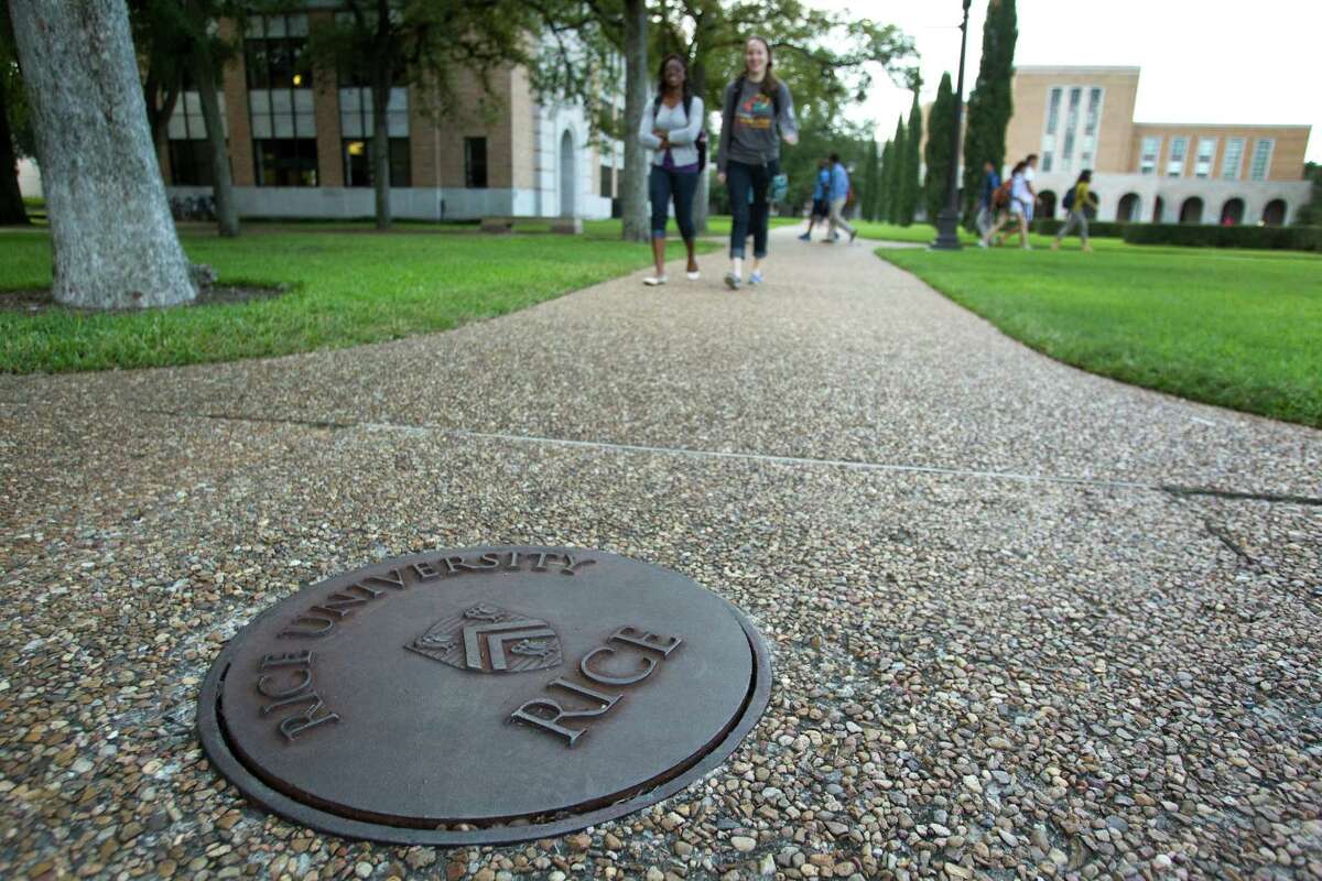 Students walk around the quad near Lovett Hall at Rice University Tuesday, Oct. 2, 2012, in Houston. Rice celebrates its 100th anniversary this year. ( Brett Coomer / Houston Chronicle )