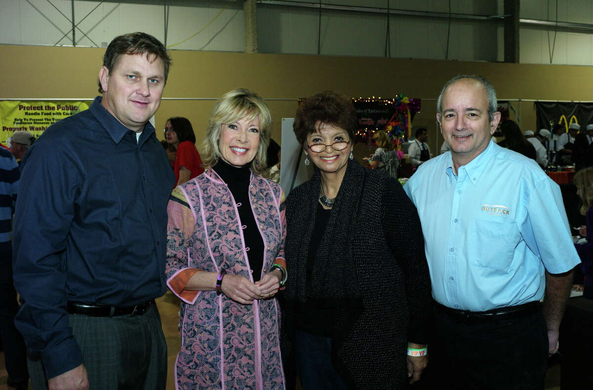 Co-chairman Randy Stokes, from left, sponsor Tanji Patton, SA Restaurant Association director Yolie Arellano and co chairman Andy Shalit gather at the Taste of San Antonio at the Freeman Expo Hall on 10/28/2012. photo by leland a. outz