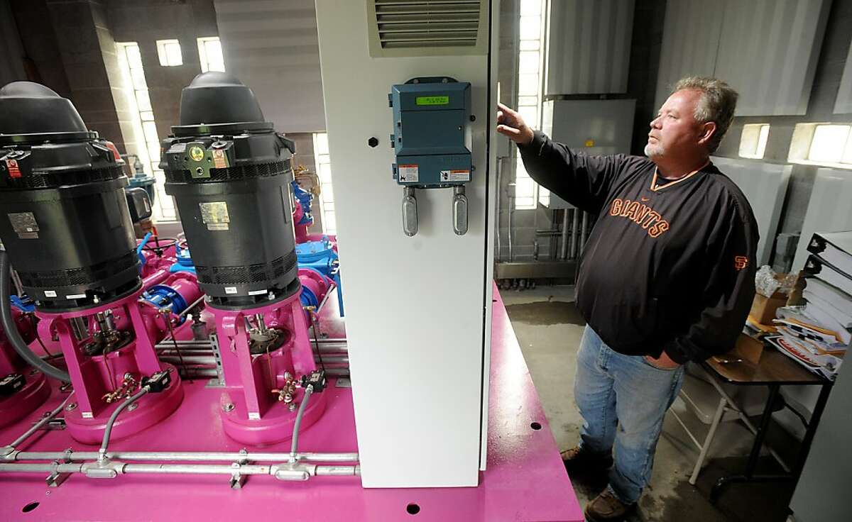 Kevin Teahan, superintendent for the Harding Park golf course, checks a recycled water system on Monday, Oct. 29, 2012, in San Francisco. Beginning Wednesday, the facility plans to use recycled water rather than the drinking water currently sprayed on the course.