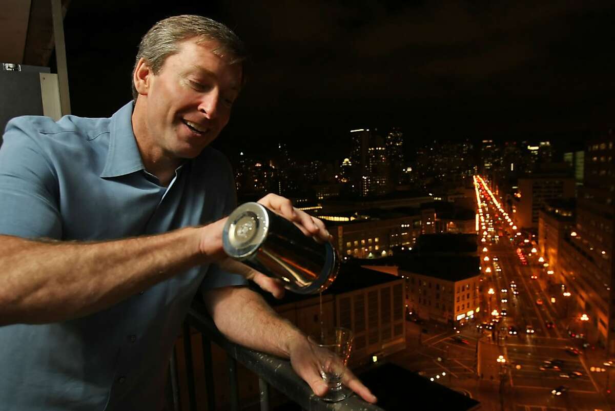 Johnny "Love" Metheny, who was a bartender and maker of Vodka, is now a screen play writer, shows off his view of his new apartment, Wed. Feb. 25, 2009, in San Francisco, Calif.