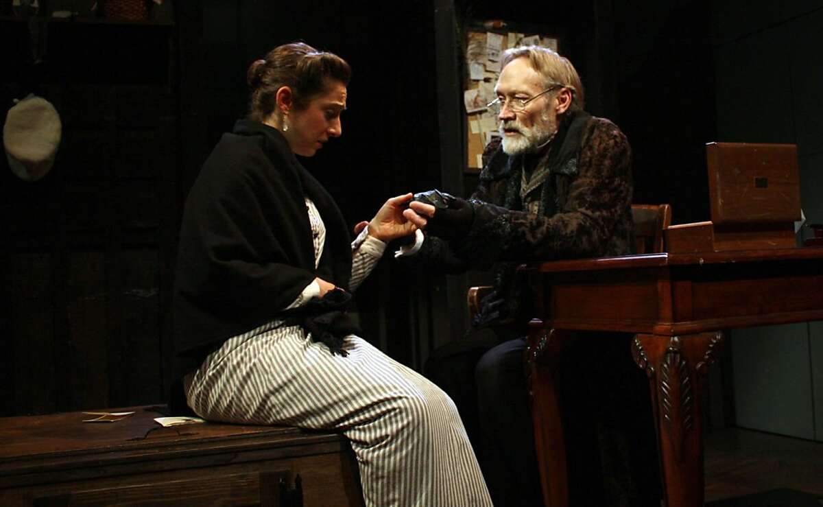 The Conservator (James Carpenter, right) gives Ellen (Caitlyn Louchard) her mistress' lost glove in "The Black Glove" in Cutting Ball Theater's "Strindberg Cycle"