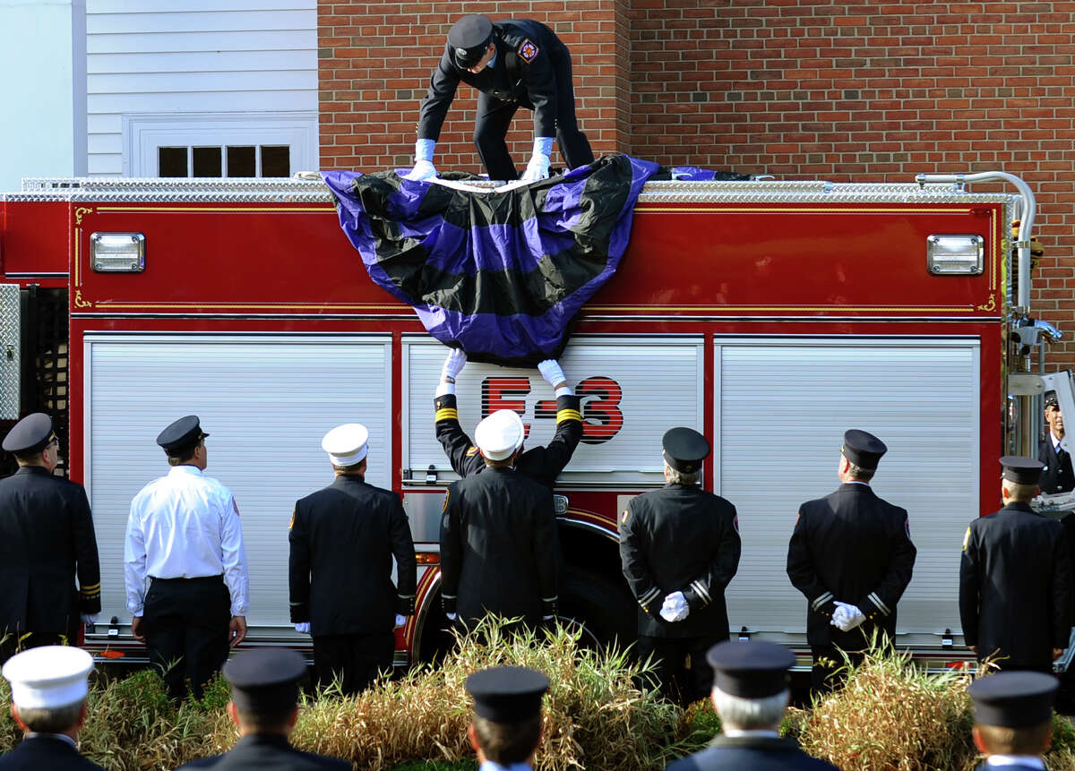 Hundreds pay tribute to fallen firefighter