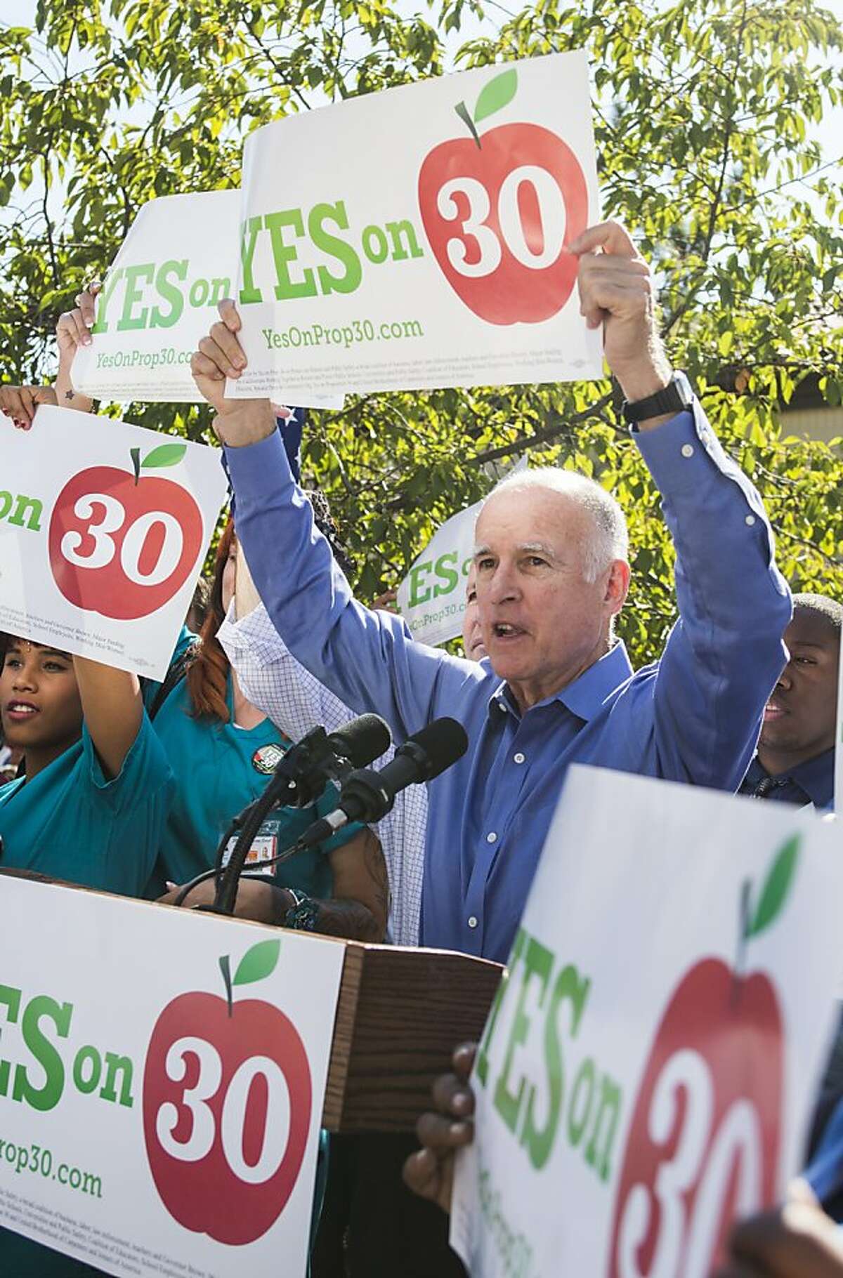 California Gov. Jerry Brown encourages students to vote for Prop 30 at a rally for his tax-raising Proposition 30, Sacramento City College, in Sacramento California, on Thursday October 18th 2012.