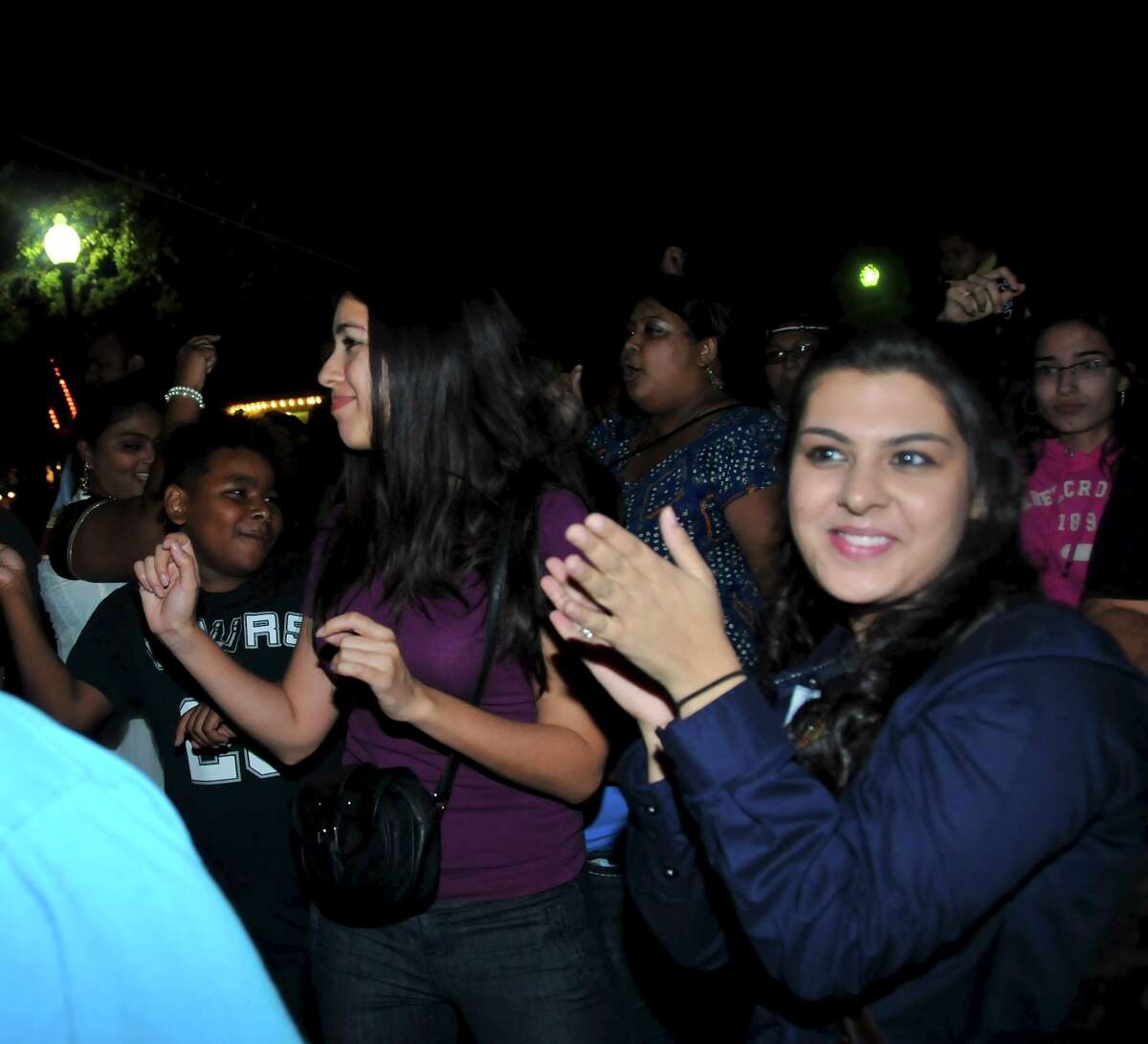 Revelers celebrate at San Antonio's Diwali Festival of Lights Saturday, Nov. 3, 2012, at HemisFair Park.