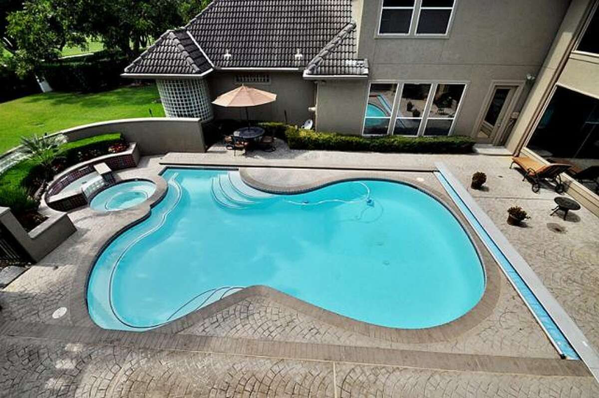 Sugar Land home offers private pool, basketball court