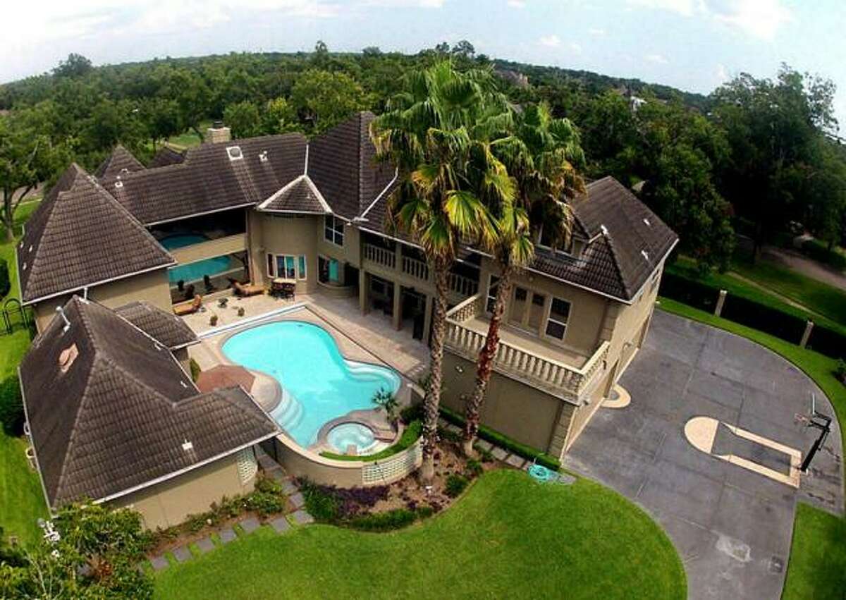 Sugar Land home offers private pool basketball court