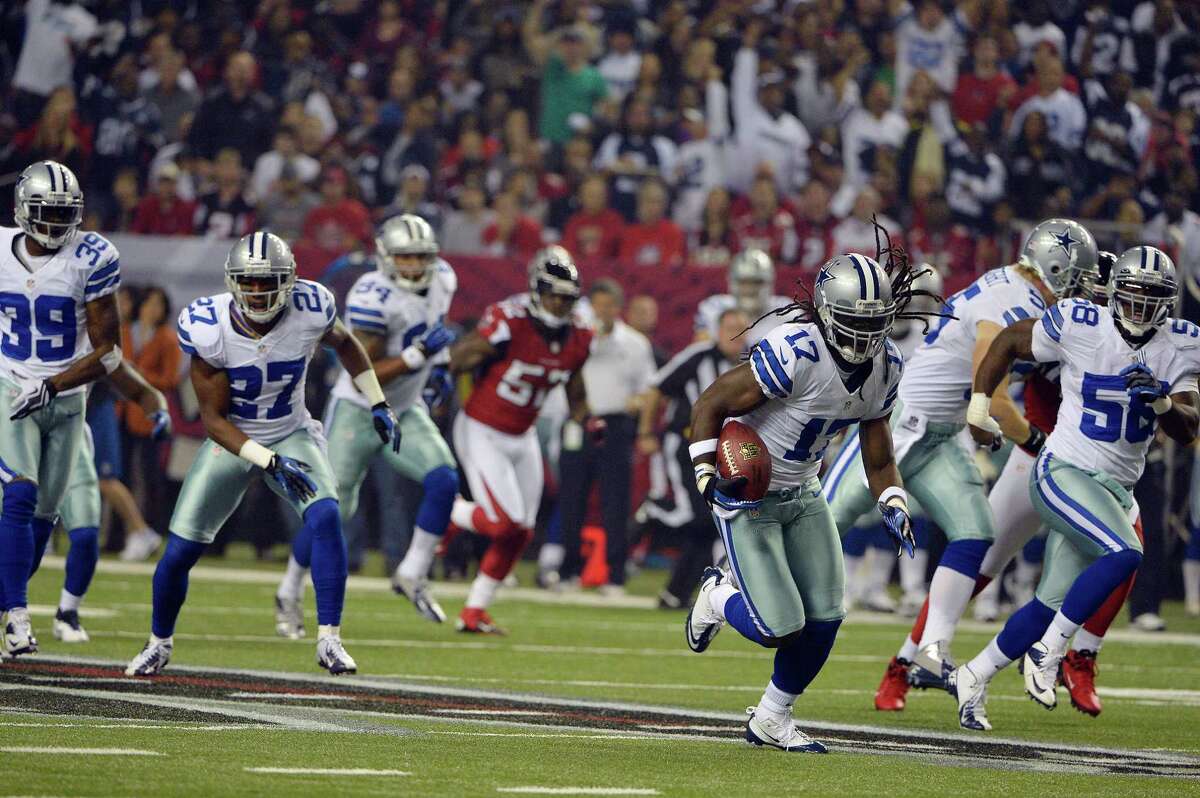 Dallas Cowboys wide receiver Dwayne Harris (17) returns a punt during the first half of an NFL football game against the Atlanta Falcons Sunday, Nov. 4, 2012, in Atlanta. (AP Photo/Rich Addicks)