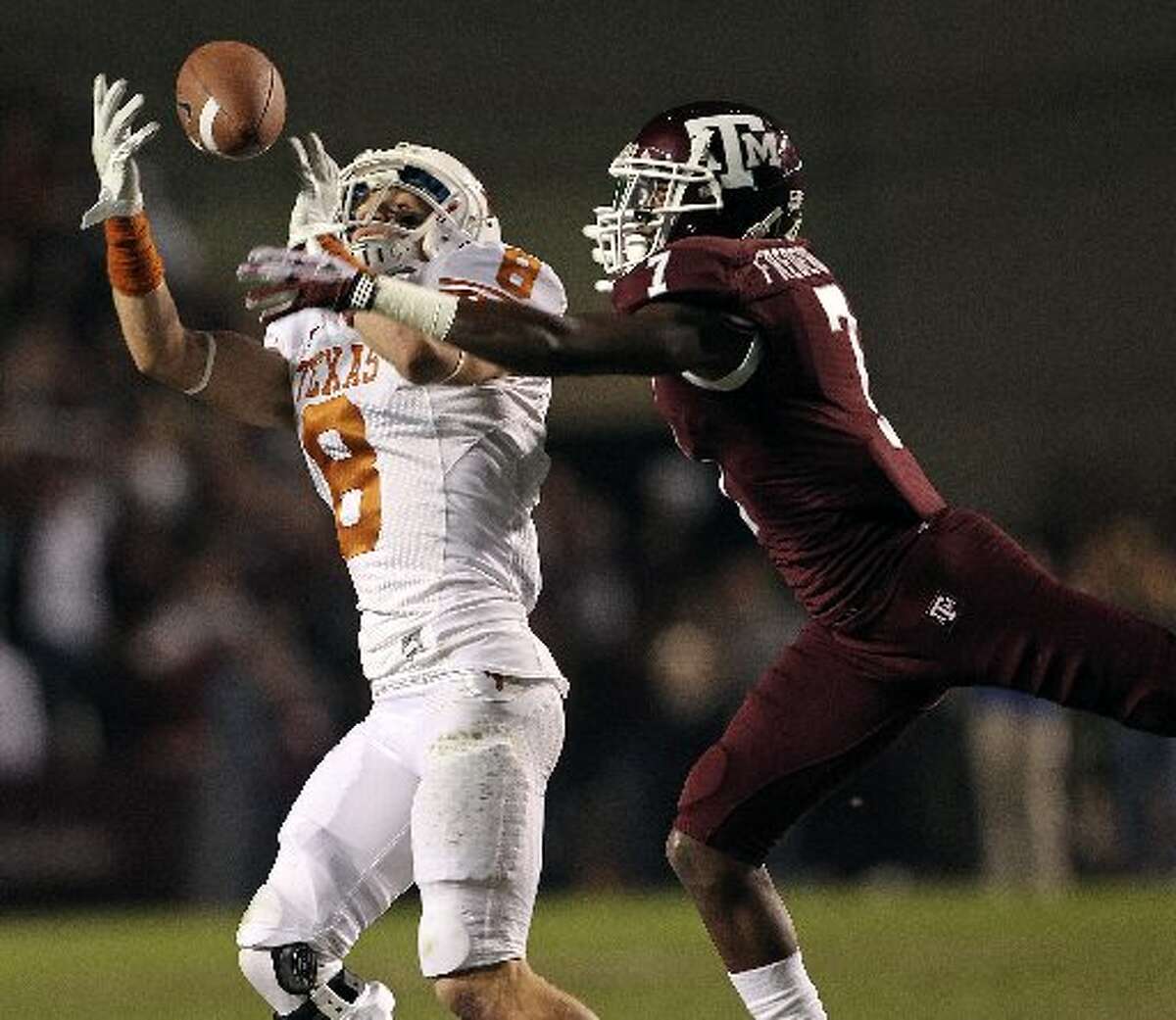 Jaxon Shipley catches a pass in front of Terrence Frederick in the first quarter as Texas A&M hosts UT at Kyle Field in College Station on November 24, 2011. Tom Reel/Express-News