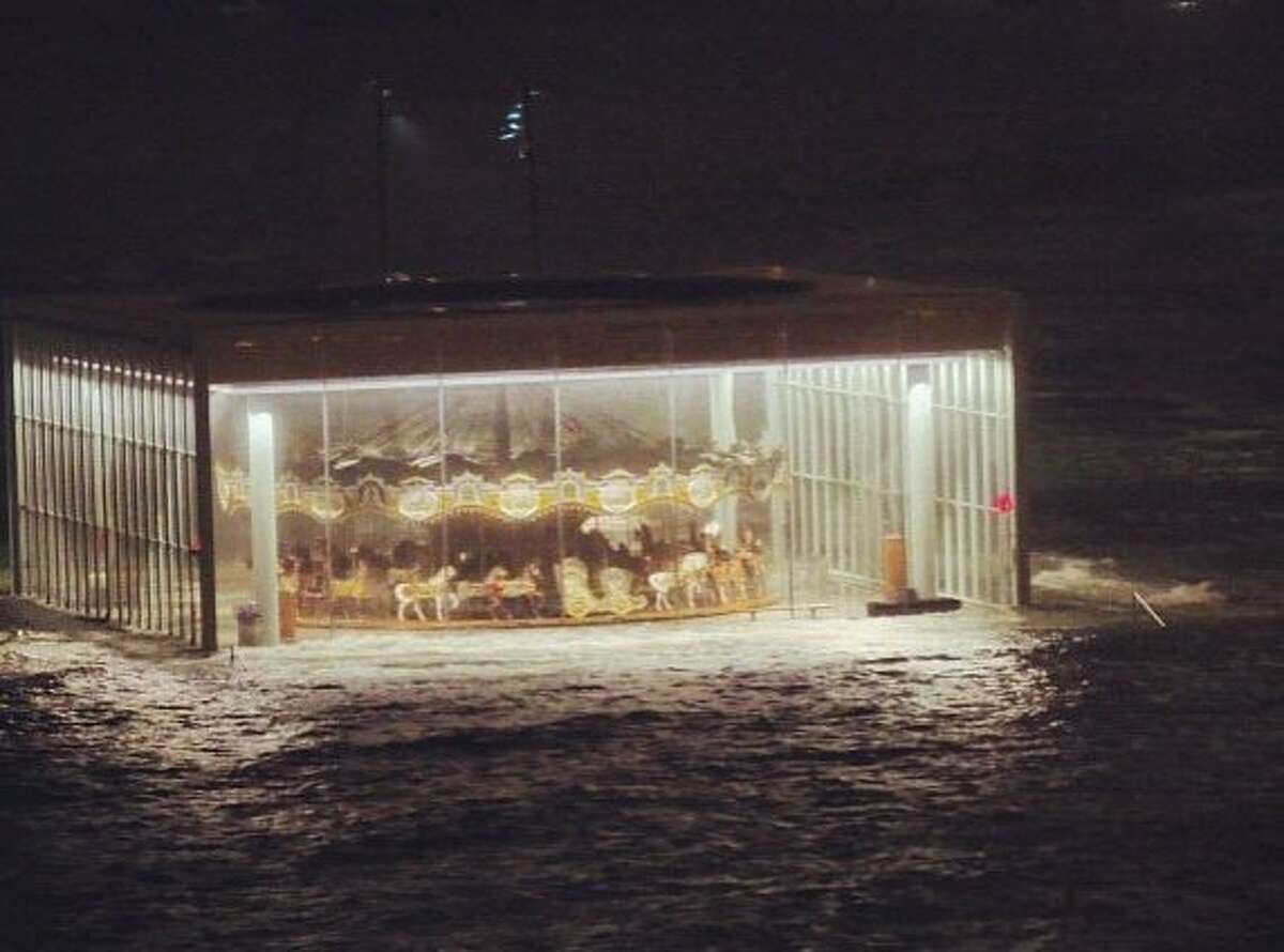 In this instagram photo provided by Ana Andjelic, Jane's Carousel in Brooklyn Bridge Park, in the DUMBO section of Brooklyn, is surrounded by floodwaters from Sandy's surge, Monday, Oct. 30, 2012, in New York. Sandy, the storm that made landfall Monday, caused multiple fatalities, halted mass transit and cut power to more than 6 million homes and businesses. (AP Photo/Ana Andjelic)