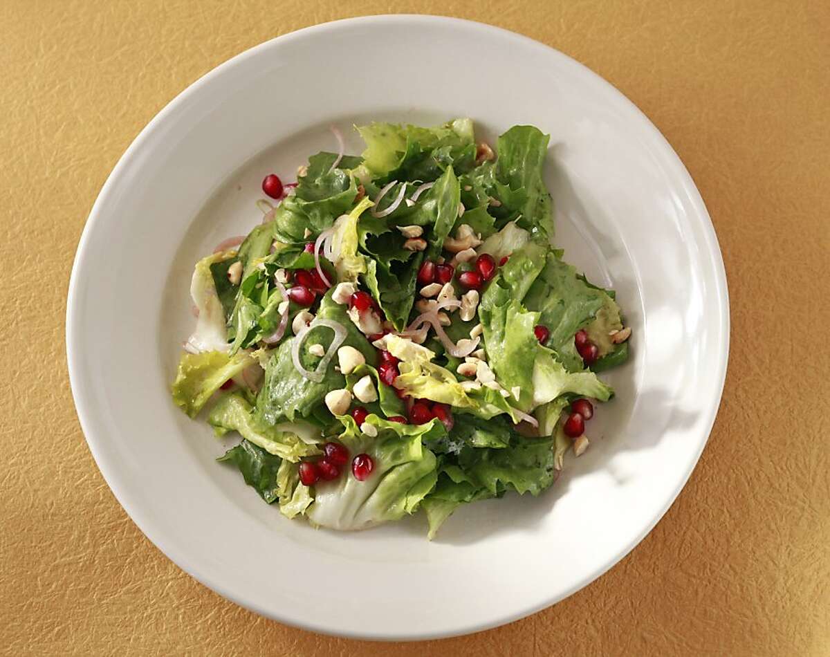 Escarole Salad with Pomegranates as seen in San Francisco, California on Wednesday, October 17, 2012. Food styled by Katie Fleming.