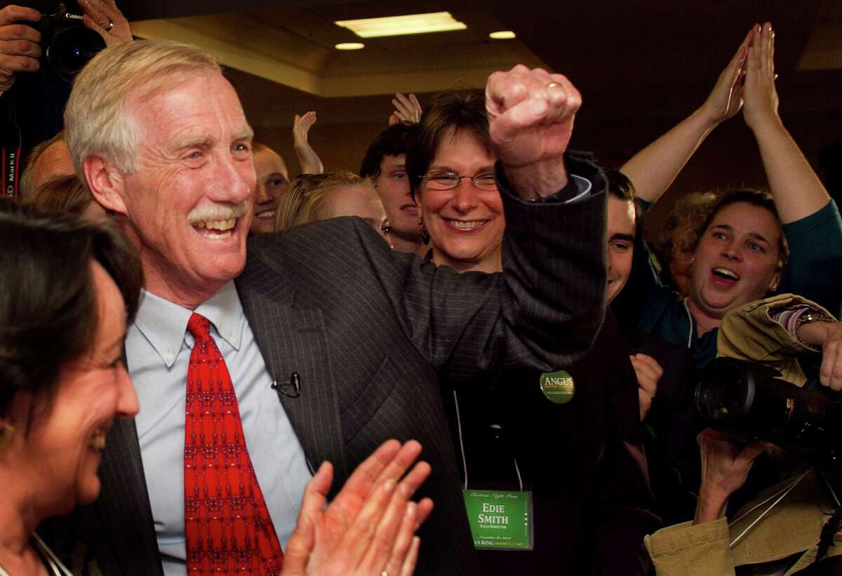Independent Angus King celebrates his victory for the U.S. Senate seat vacated by Olympia Snowe, R-Maine, Tuesday, Nov. 6, 2012, in Freeport, Maine. (AP Photo/Robert F. Bukaty)