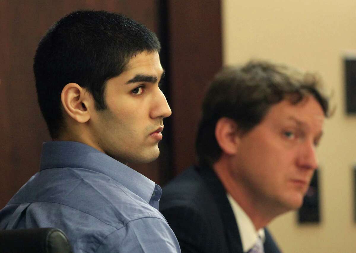 Jasjeet Singh, left, with one of his lawyers, Donald Flanary III, on Nov. 1, 2012.