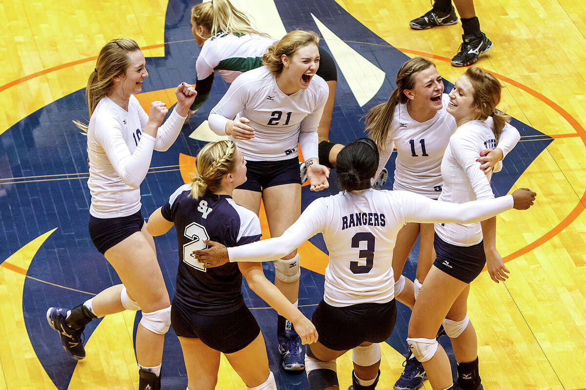 The Smithson Valley Lady Rangers celebrate a point during the first set of their Class 5A third round volleyball match with Reagan at the UTSA Convocation Center on Nov. 6, 2012. Smithson Valley won the match in three straight sets: 25-23, 25-21 and 25-19. MARVIN PFEIFFER/ mpfeiffer@express-news.net