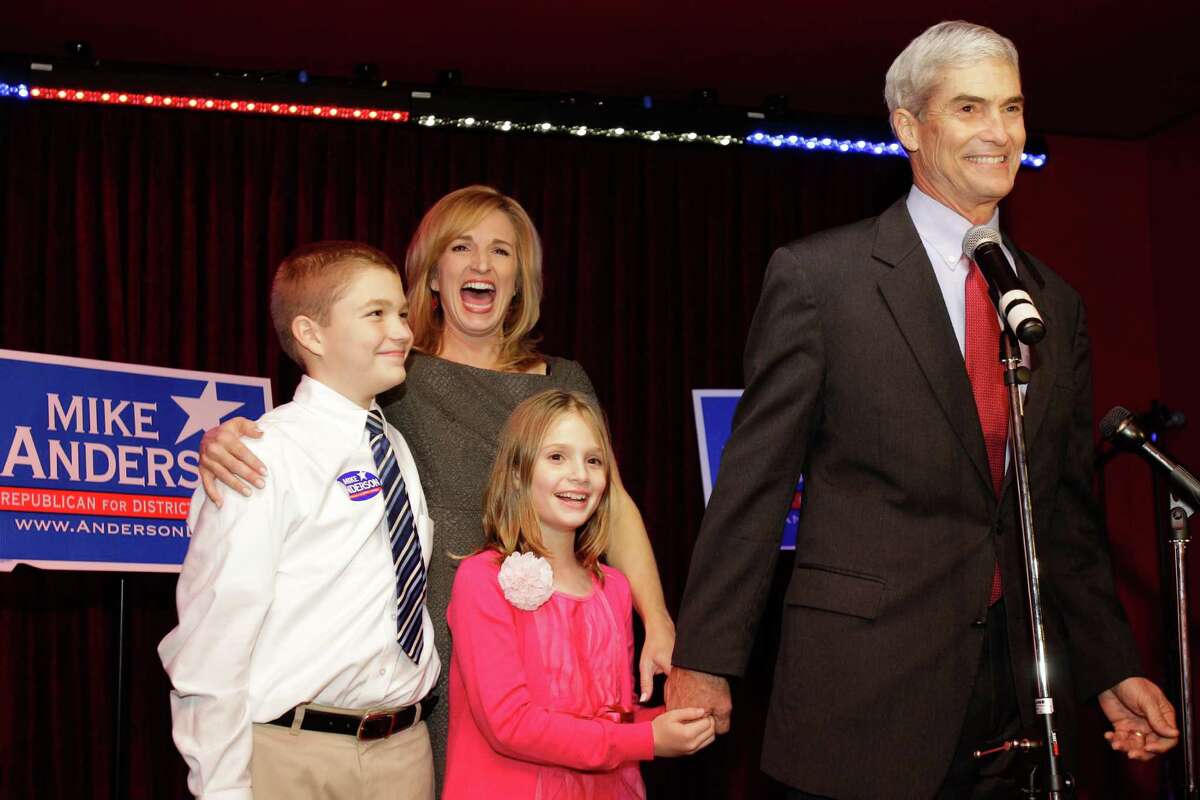 Republican candidate for Harris County district attorney Mike Anderson gives a victory speech to supporters as he stands his his wife, Devon Anderson, their son, Sam, 11, and daughter, Brynn, 9, at election watching party at Gloria's, 2616 Louisiana, Tuesday, Nov. 6, 2012, in Houston.