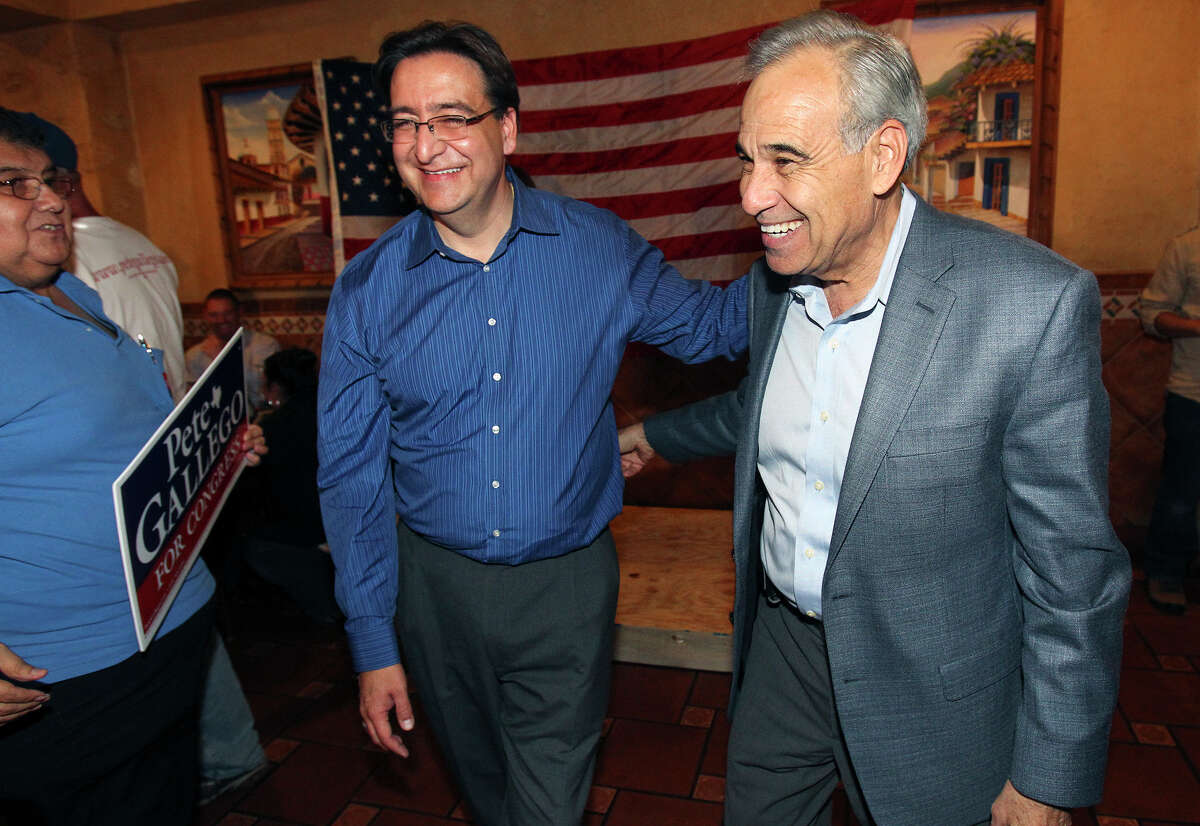 Charlie Gonzalez congratulates Pete Gallego at the election night watch party for State Representative Pete Gallego, D-Alpine, who is challenging U.S. Representative Francisco Canseco for his seat in the U.S. House District 23 on November 6, 2012.