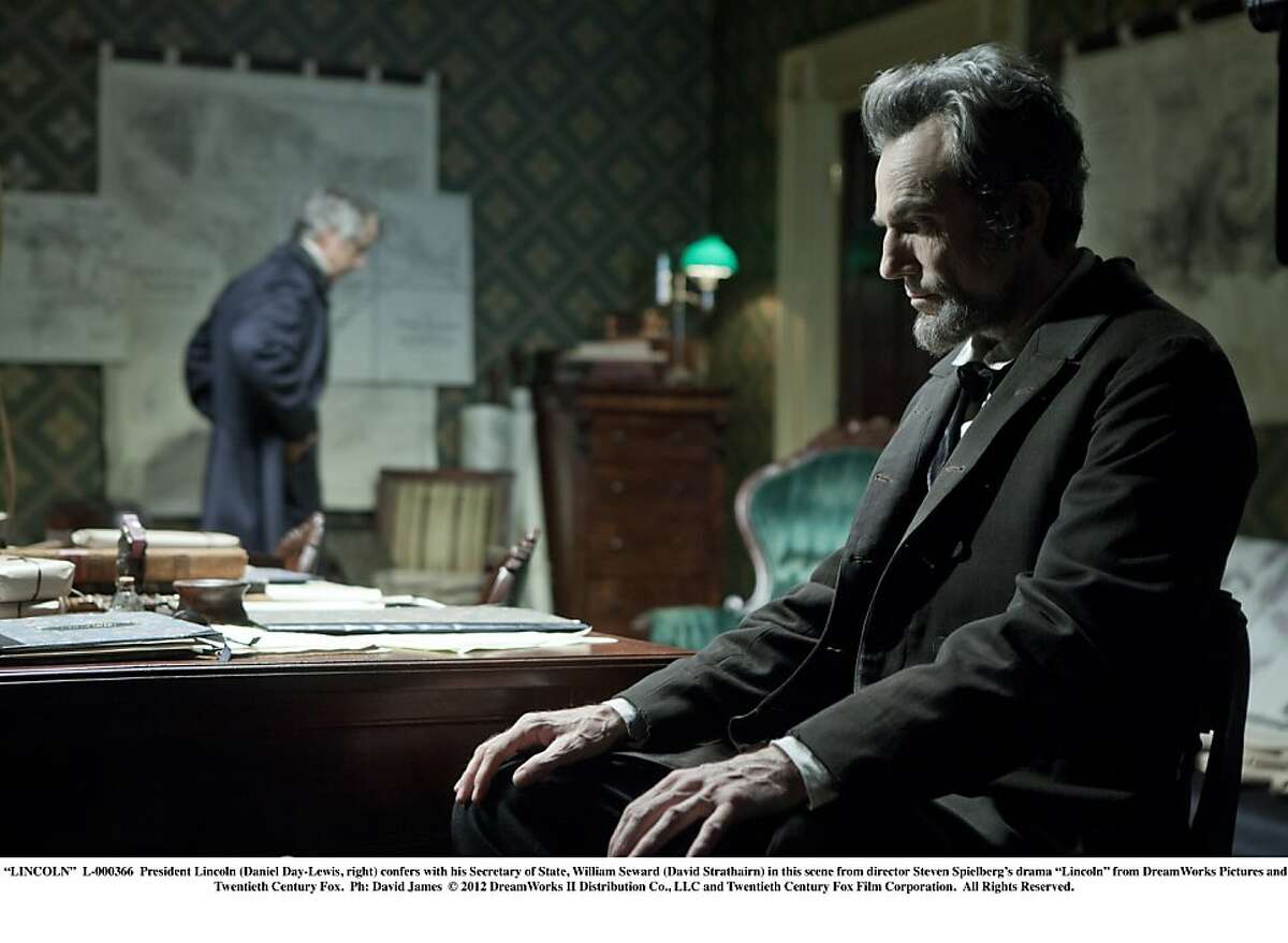 President Lincoln (Daniel Day-Lewis, right) confers with his Secretary of State, William Seward (David Strathairn) in this scene from director Steven Spielberg's drama "Lincoln."