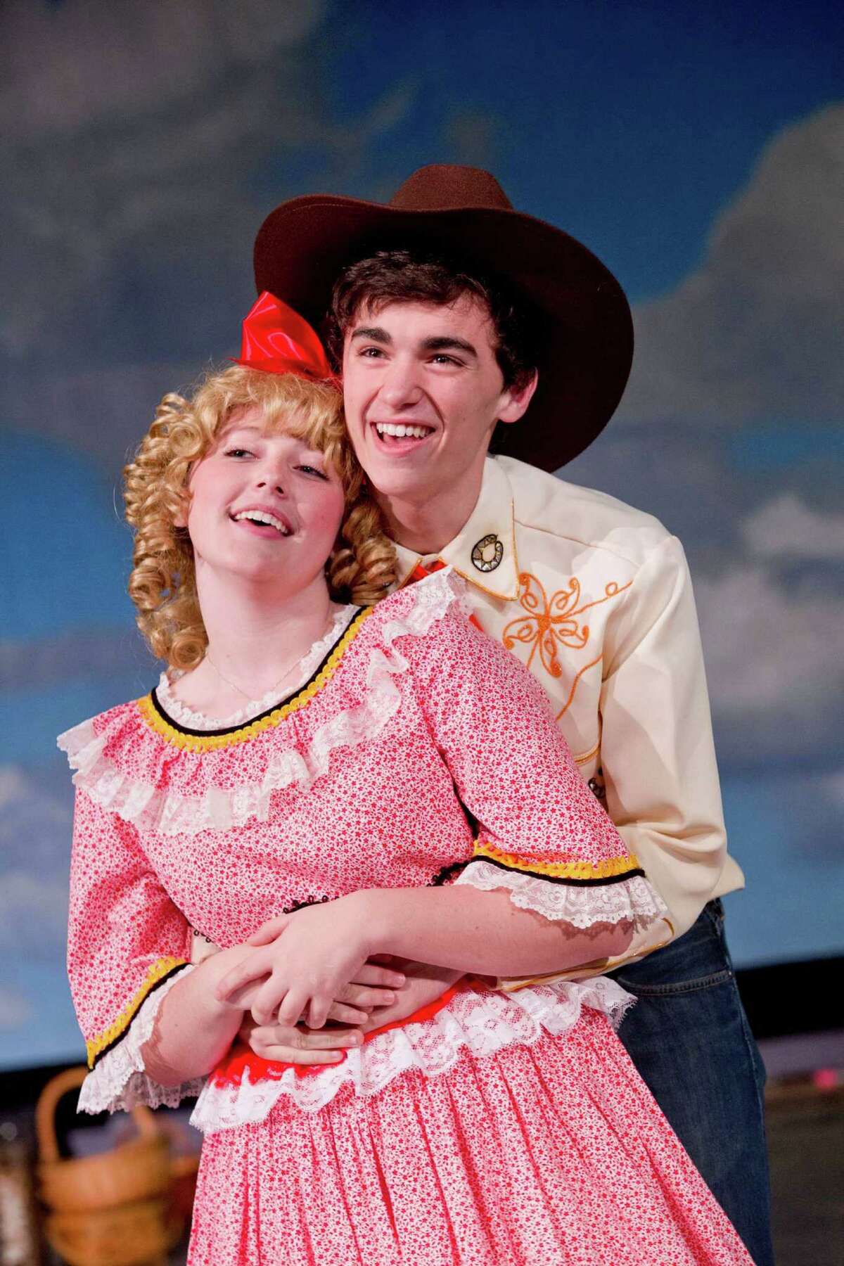 Maddy Rozynek plays Ado Annie Carnes and Tyler Jent plays Will Parker in Staples Players' fall musical "Oklahoma!"