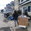 Carl Loschiavo, owner of the house shown behind him on East Broadway in Milford, took to a grill on Friday and Saturday after the passing of Hurricane Sandy to cook hot dogs and hamburgers for residents and emergency workers.